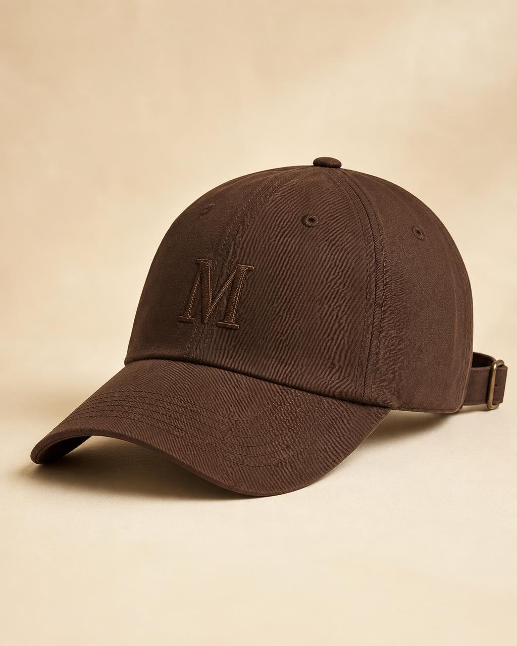 CORE 005 Cap in Chocolate with the embroidered M at the front panel